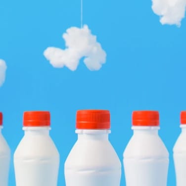 Mobile Milk bottles Image